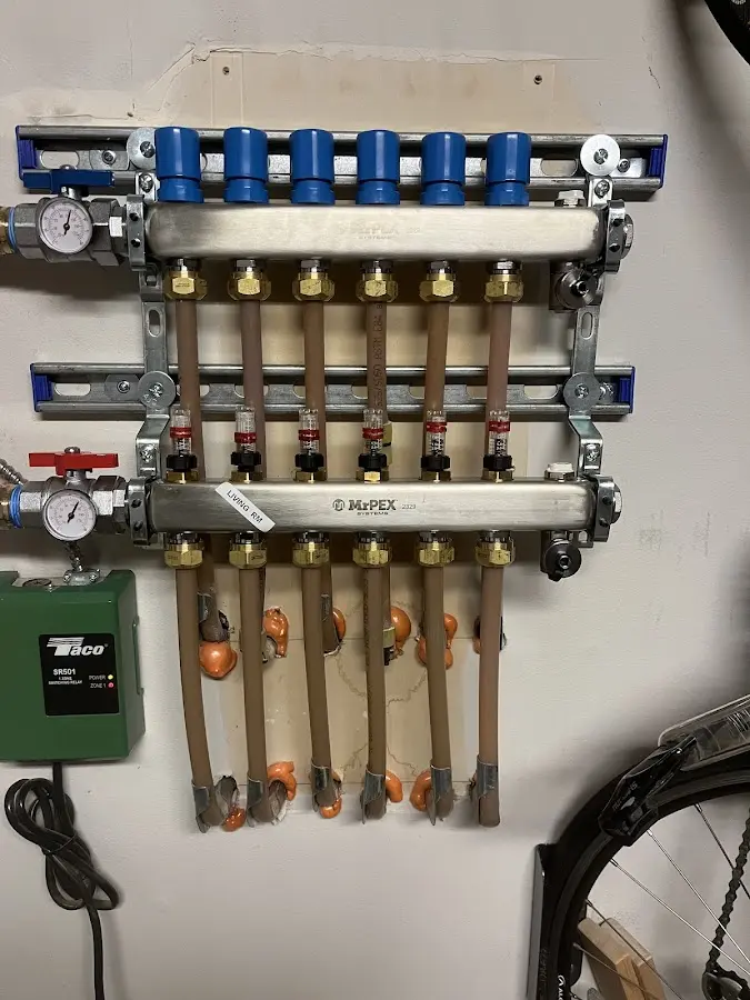 Plumber performing Gas Line Installation at a residential property in Germantown